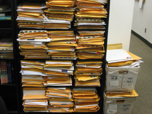 A Pile of Unsolicited Manuscripts Taken by Editor Kate Sullivan